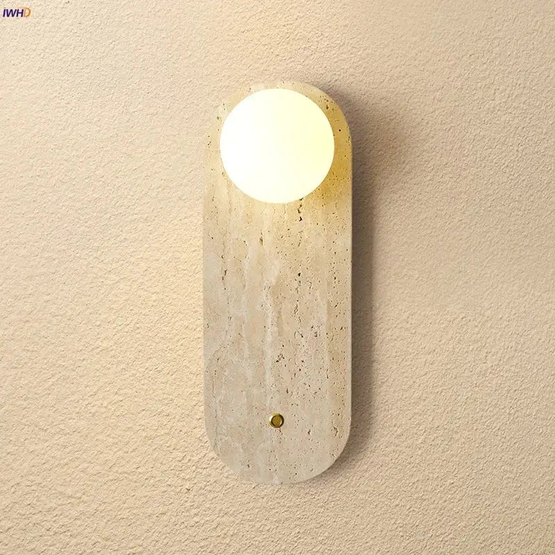 Modern beige stone led wall light with textured body and glowing circular bulb ideal for bedroom decorbites led wall fixture