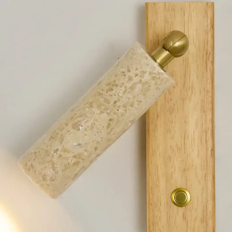 Modern beige travertine copper led wall lamp with beige speckled concrete cylindrical sconce and brass accents for bedroom decorbites copper led wall decor