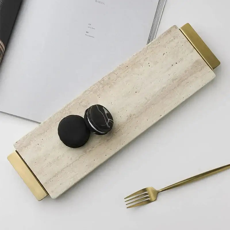 Modern beige travertine stone tray with gold-toned metal ends ideal for kitchen decorbites beige travertine decor