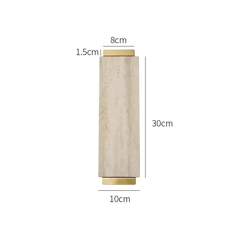A tall slender beige travertine stone vase with gold-toned metal caps perfect for decorbites beige travertine decor