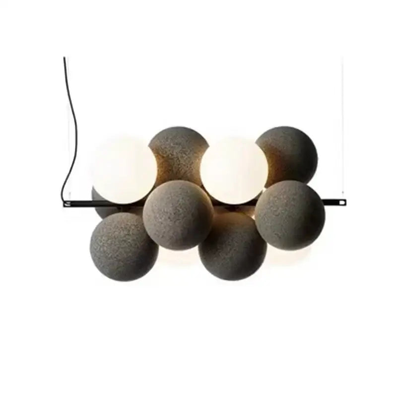 Modern beige and white abstracta pendant lamp featuring matte black spherical bulbs for dining room decorbites pendant lamp