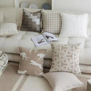 Modern beige and white jacquard cushion cover featuring a leaping cat pattern ideal for living room decorbites cushion covers