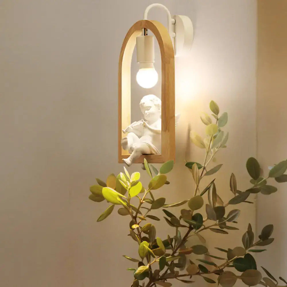 Modern beige wooden arched wall lamp nine inches with white ceramic angel figurine and exposed bulb power source included