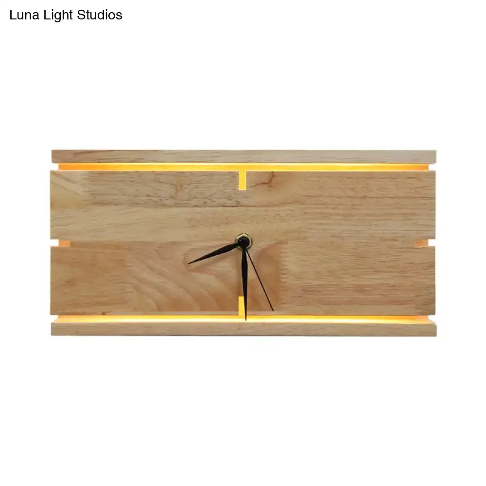 Modern beige wooden led wall clock with warm yellow lighting featuring black hands on natural wood grain 110v-120v 220v-240v