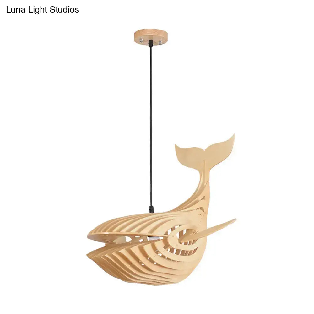 A modern hanging light beige wooden whale kids pendant lamp with sleek layered design and natural wood finish