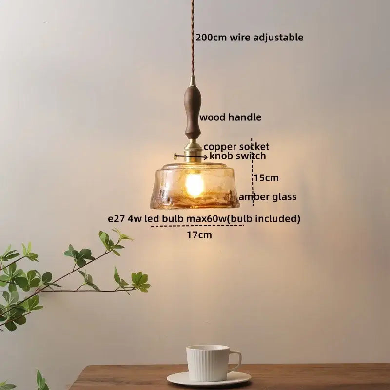 A warm amber glass pendant light with wooden handle and copper socket featuring adjustable 200cm wire decorbites ceramic led ceramic led pendant