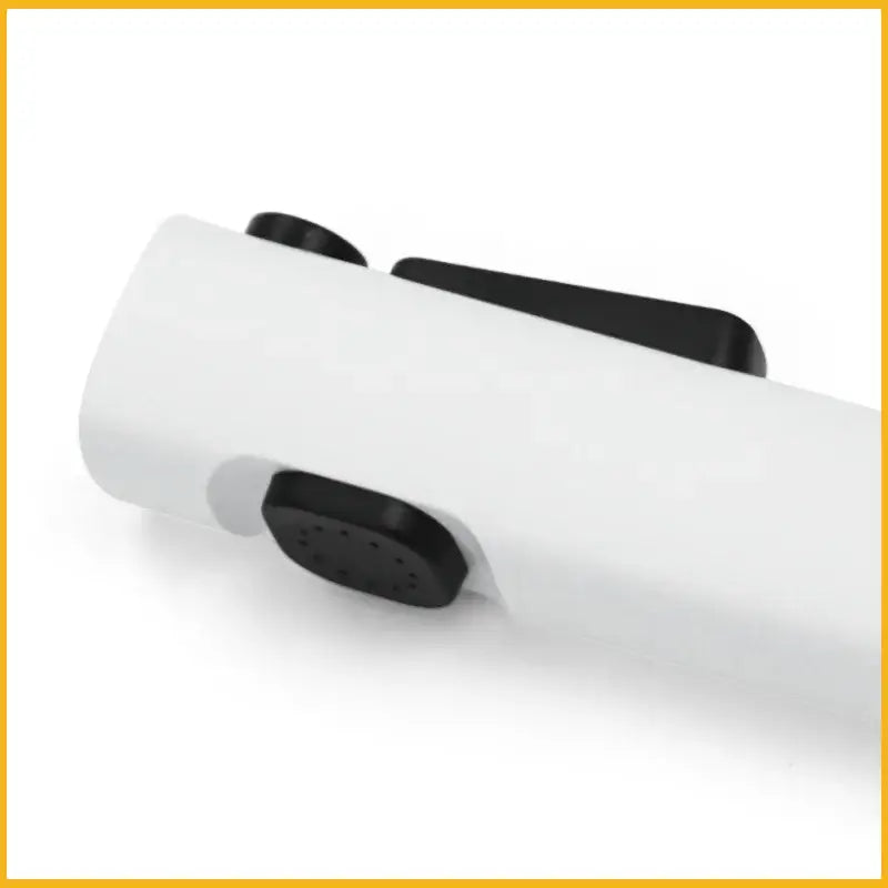 White plastic modern bidet faucet set with black rubberized buttons and textured grip for bathroom use