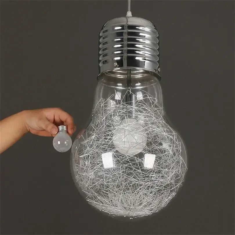 Modern big bulb led pendant light with clear glass and chrome base featuring an intricate wire mesh decorbites big bulb