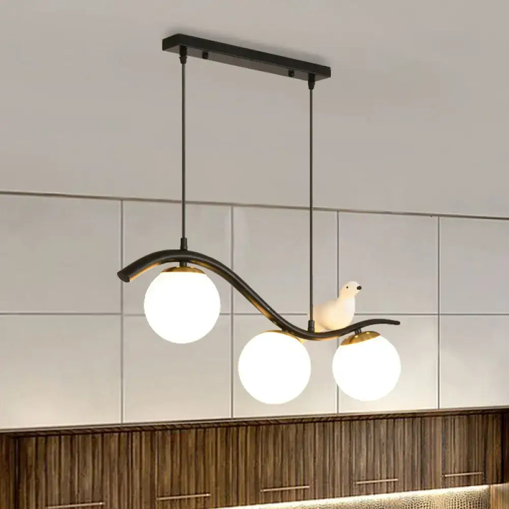 Decorbites modern 3-head black metal pendant lamp with clear white frosted ball shade hanging and white ceramic bird decor