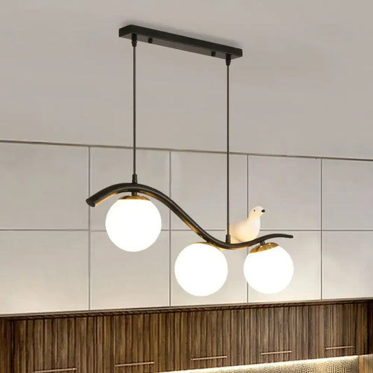 Decorbites modern 3-head black metal pendant lamp with clear white frosted ball shade hanging and white ceramic bird decor