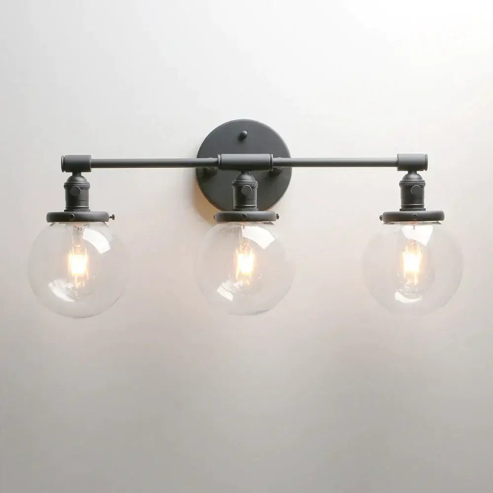 Modern black wrought iron wall sconce with three clear glass globe shades for bathroom vanity wall sconce bathroom use