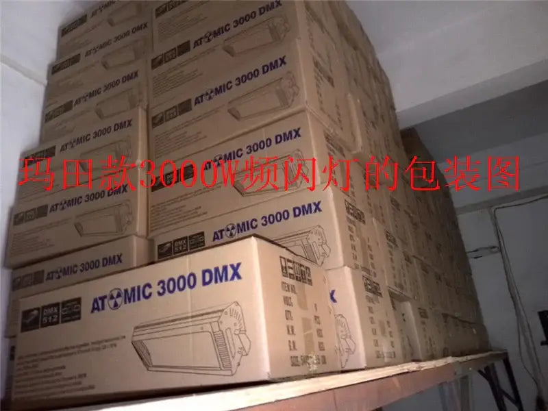 Stacks of brown cardboard boxes labeled atomic 3000 dmx contain modern black 3000w dmx strobe lights for clubs