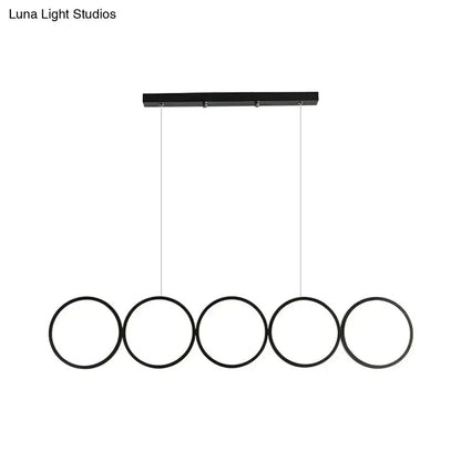 Decorbites™ led ceiling 5-ring black hanging island pendant light metal fixture with warm white light over table