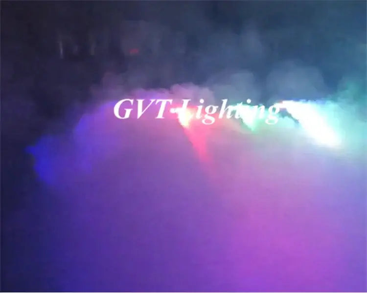 Modern black 500w rgb led smoke machine emits vibrant red green and blue beams through swirling fog for party use