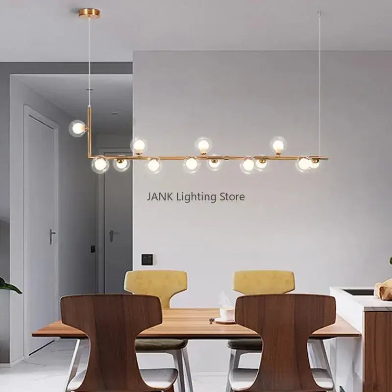 Modern black 7 light glass shade pendant light featuring gold-toned double glass shade spherical bulbs for dining room