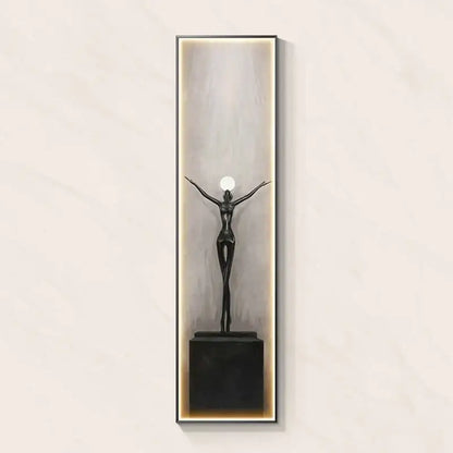 Modern black abstract art led wall lamp featuring a metallic figure holding a glowing orb for living room decorbites decor