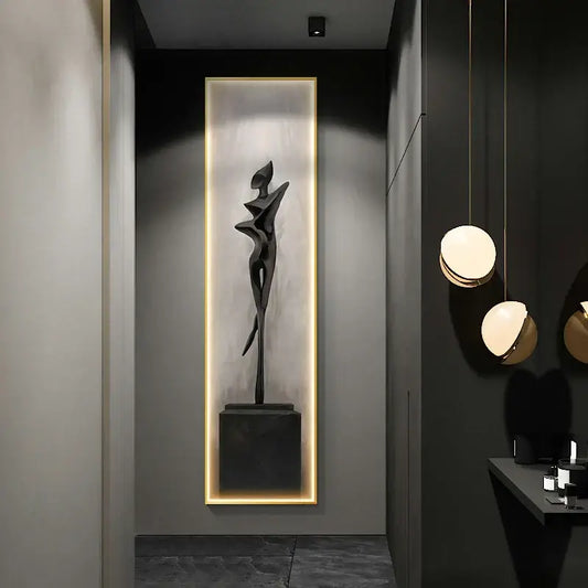 A sleek black abstract art led wall lamp featuring a stylized human figure sculpture for modern living room decor