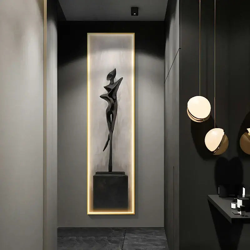 A sleek black abstract art led wall lamp featuring a stylized human figure sculpture for modern living room decor