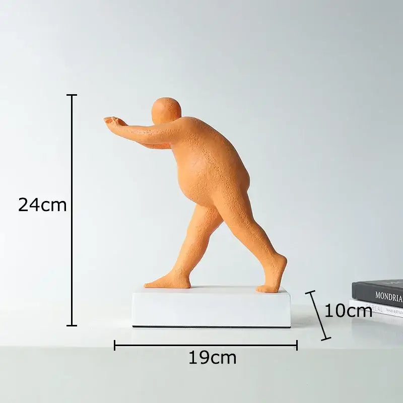 Orange matte-finish abstract resin sculpture figurine in mid-stride on white base for modern home decor