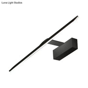 Modern black acrylic led vanity light with sleek wall-mounted design emitting warm white light for bedroom use