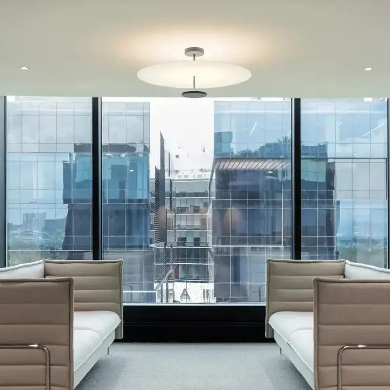 Modern black acrylic round chandelier with a minimalist white diffuser and metallic fixture for living room decorbites black acrylic