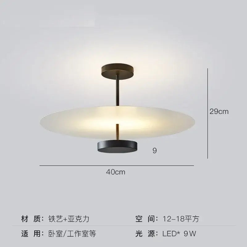 Modern black acrylic round chandelier with a matte black iron frame and frosted acrylic shade featuring an led bulb