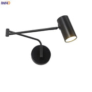 Modern black adjustable acrylic iron led wall lamp with cylindrical head and articulated arm for bedroom reading light