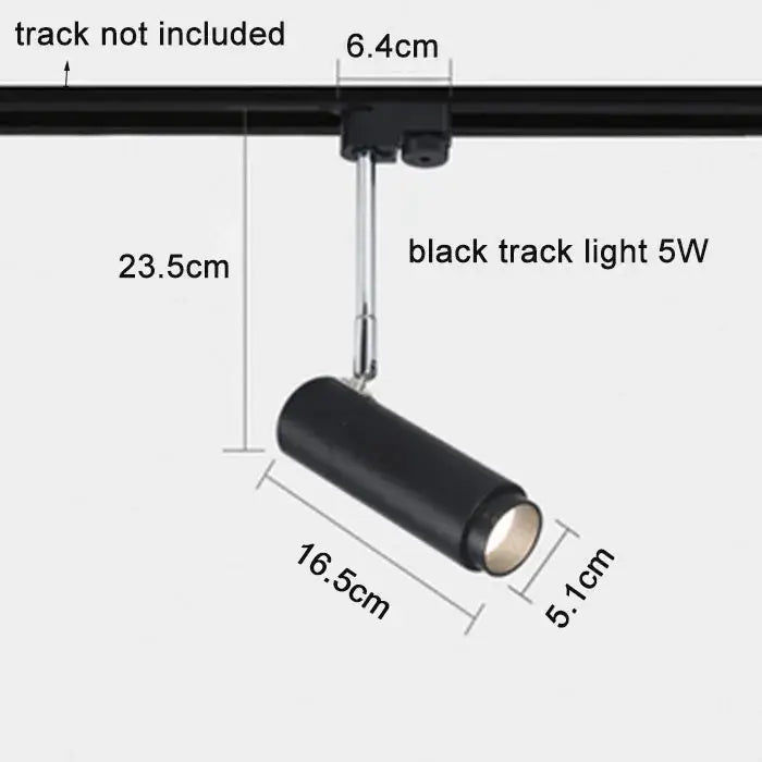 Modern black adjustable focus track lights with matte finish and metallic mounting arm for commercial gallery use by decorbites adjustable focus