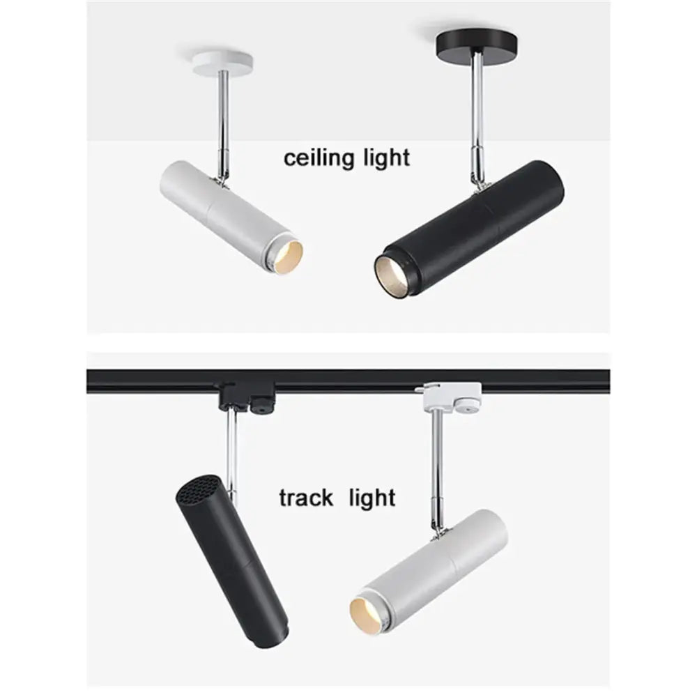 Modern black adjustable focus track lights with sleek cylindrical design and adjustable arms for commercial gallery lighting