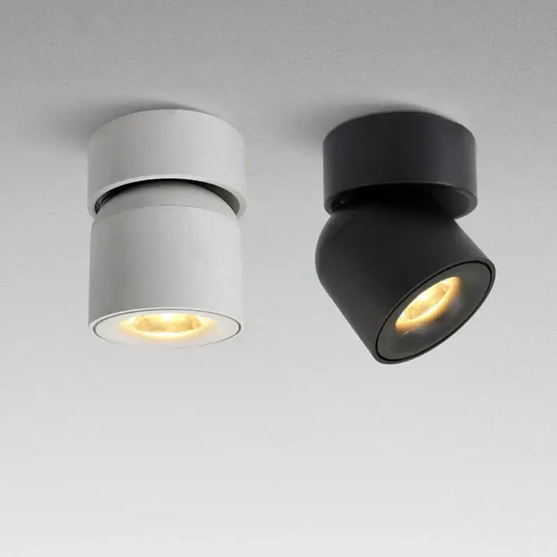 Modern black adjustable led ceiling downlight with matte white and black finishes and decorbites adjustable led heads emitting warm light
