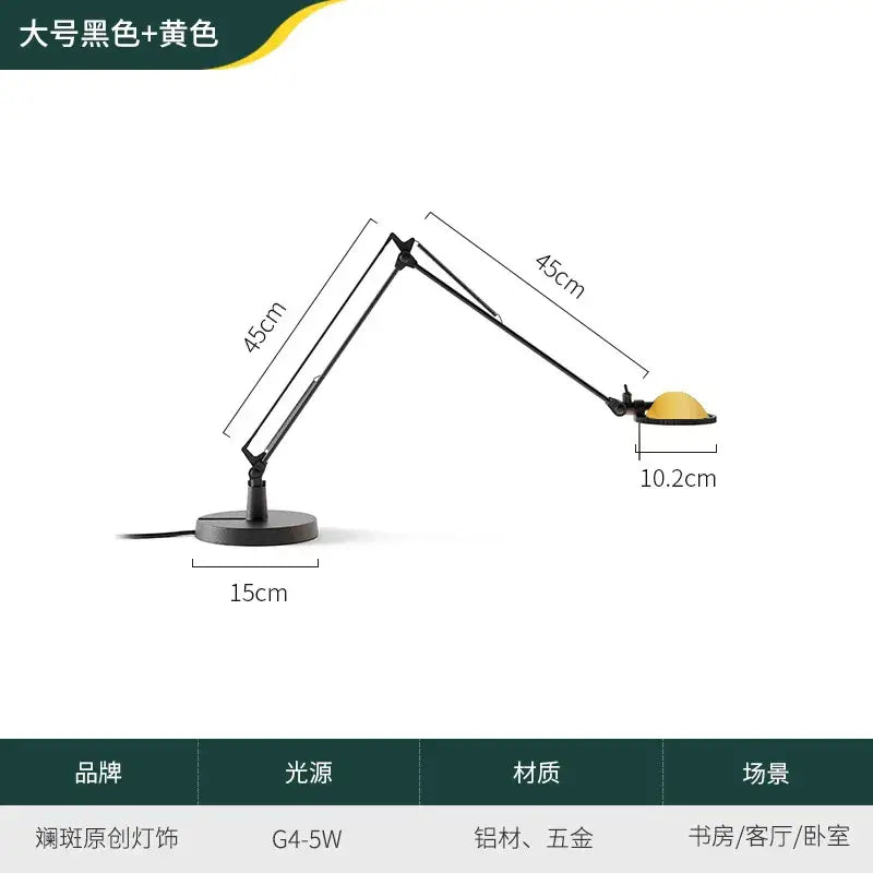 Modern black adjustable led desk lamp with matte aluminum base yellow articulated arm and golden dome shade for study or bedroom