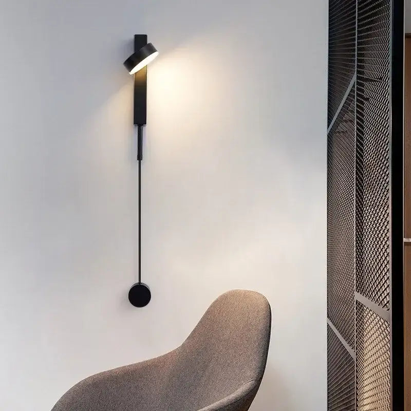 Black minimalist modern wall lamp with sleek elongated design and adjustable led wall head for bedroom decorbites adjustable led lighting