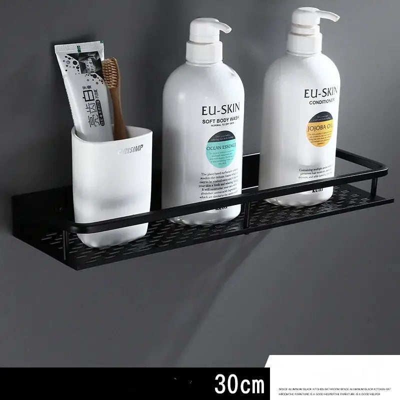 Modern black aluminum bathroom shelf with textured grid design and towel bar for shower storage by decorbites