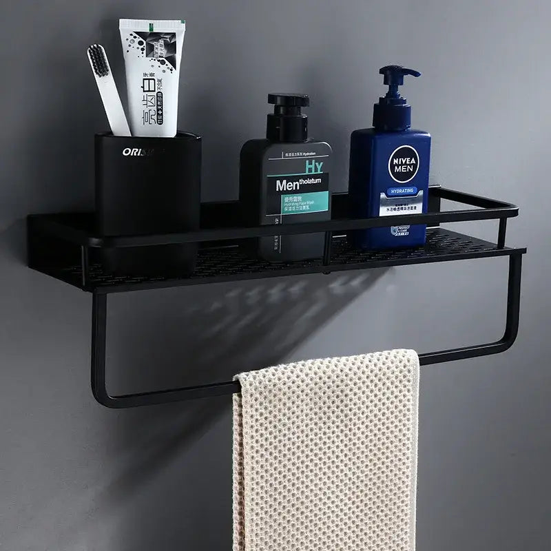 Modern black aluminum bathroom shelf with towel bar and mesh surface by decorbites for shower storage