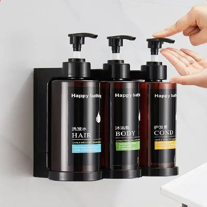 Modern black amber soap dispenser set with wall-mounted black dispenser holding hair body and conditioner bottles