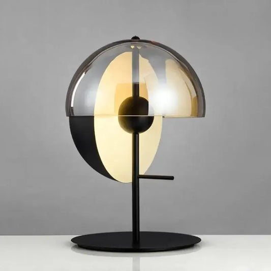 Modern black and amber glass table lamp with translucent amber glass dome and circular base for bedroom decorbites glass table