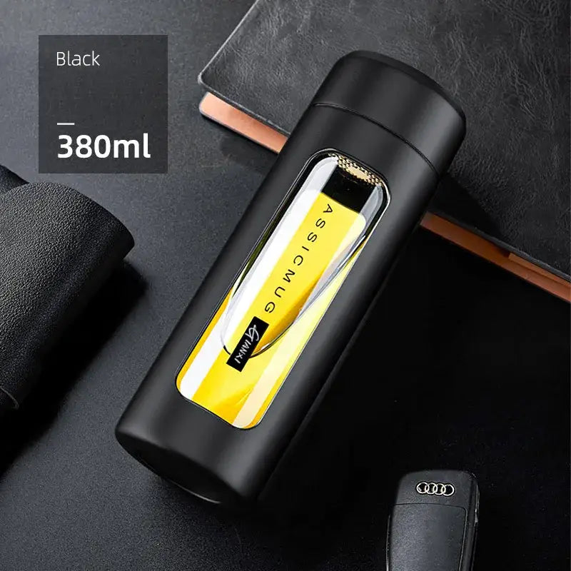 Modern black and amber insulated glass water bottle travel mug with 380ml capacity and yellow interior visible through window