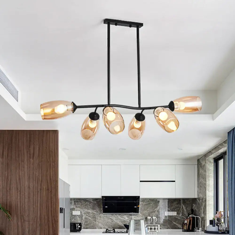 Modern black metal island pendant light with five amber glass shades and branch design for ceiling hanging fixture