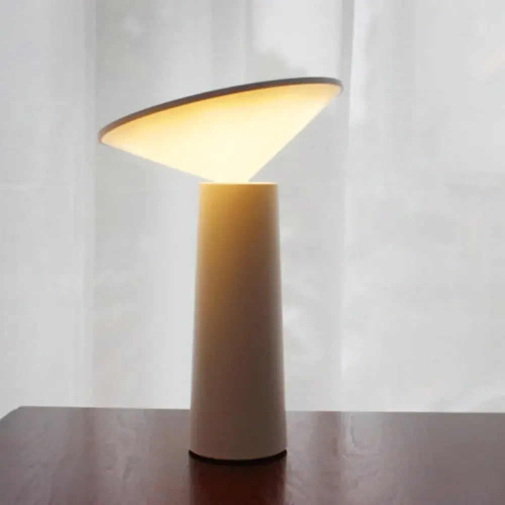 Modern black and beige led usb desk lamp with touch sensor featuring a warm-toned minimalist cylindrical base and conical shade