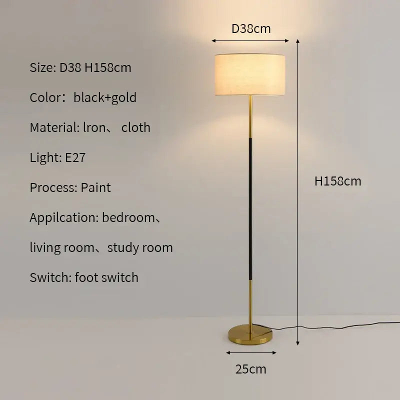 Modern black and gold floor lamp with cylindrical cloth shade, iron frame, and foot switch for living room use