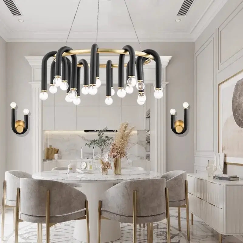 Modern black and brass aluminum tube dimmable chandelier with curved arms and spherical bulbs for dining room decorbites black aluminum