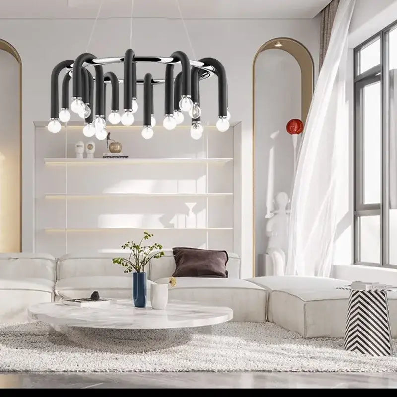 Modern black and brass aluminum tube dimmable chandelier with black aluminum tube arms and exposed bulbs for dining room decorbites black aluminum