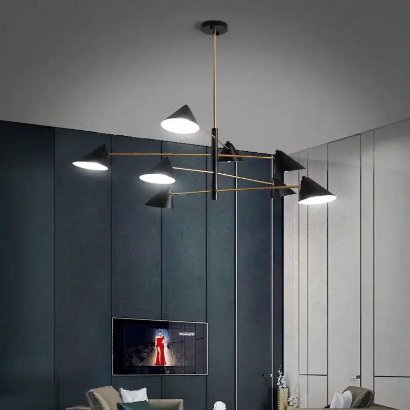 Modern black and brass cone pendant light with gold-toned metal arms for dining room decorbites cone pendant light