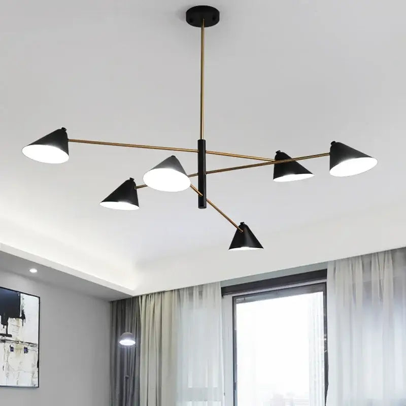 Modern black and brass cone pendant light with conical shade and cylindrical fixture for dining room decorbites cone pendant