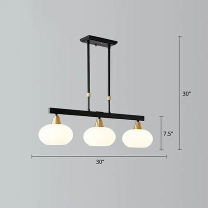 Decorbites minimalist black linear hanging lamp with brass accents and three frosted glass globe shades for dining room island lighting