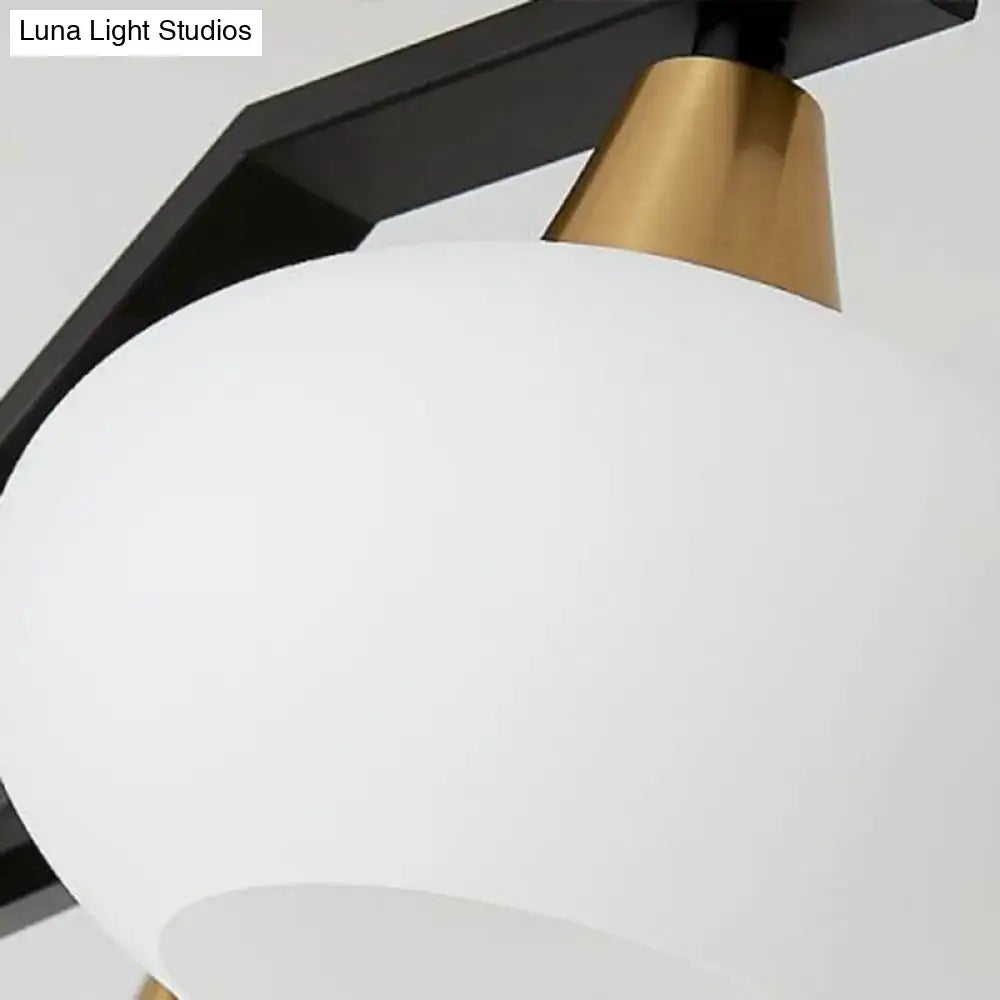 DecorBites minimalist black linear hanging lamp with matte white frosted glass globe and brass accent for dining room island