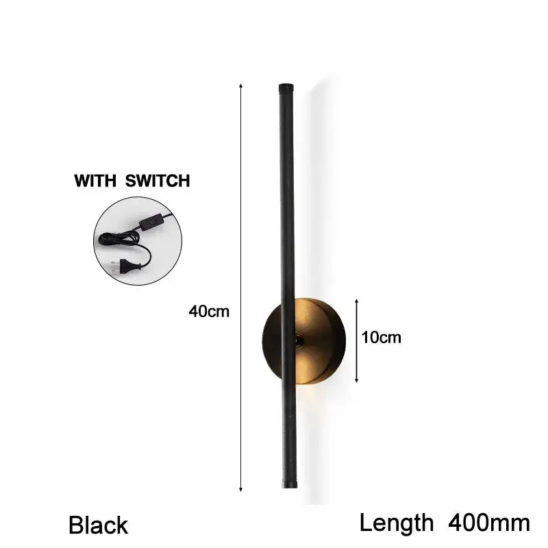 Modern black and brass rotation led wall light featuring a sleek vertical rod and circular base for living room use