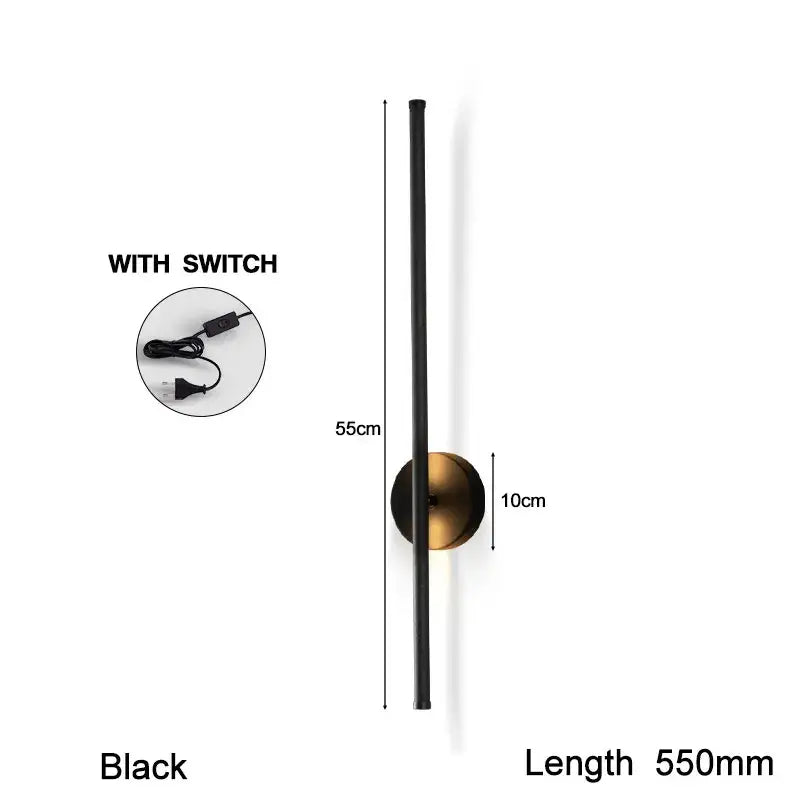 Modern black and brass rotation led wall light featuring a minimalist vertical rod and antique brass circular base for living rooms