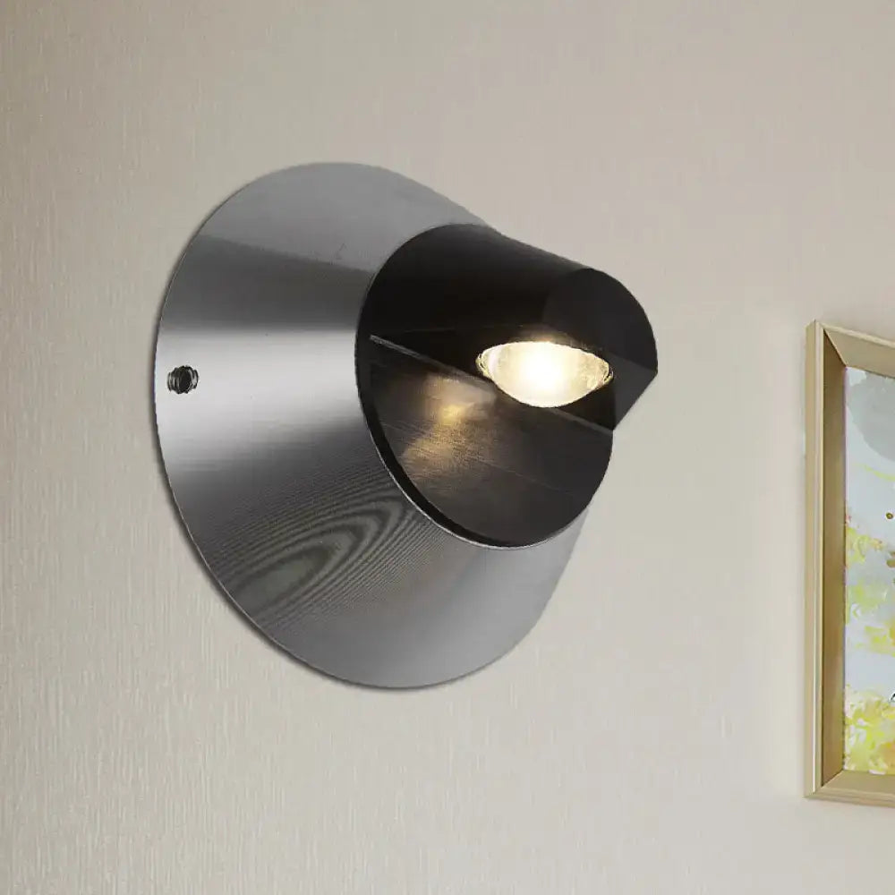 Modern black and brushed steel conical wall light with sleek brushed metallic finish and black accent housing for corridors