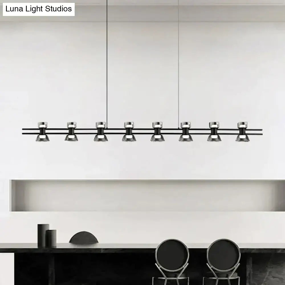 Modern black and chrome linear led strip lamp with eight sleek metallic spotlights for kitchen island lighting